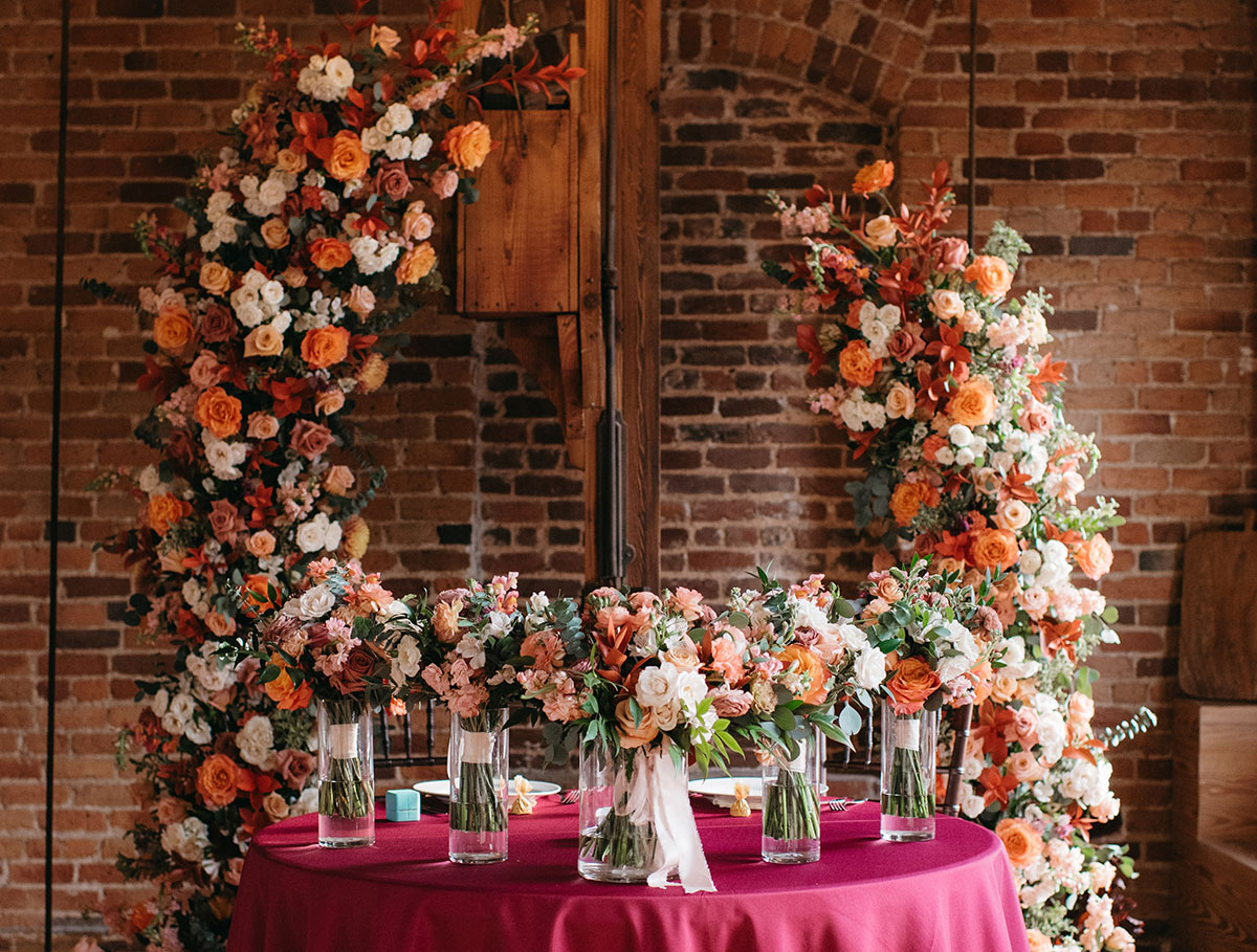 Wedding flower arch repurposed as sweetheart table backdrop, FleursTouch Tacoma